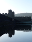 FZ010762 Sun rays over Caerphilly castle wall.jpg